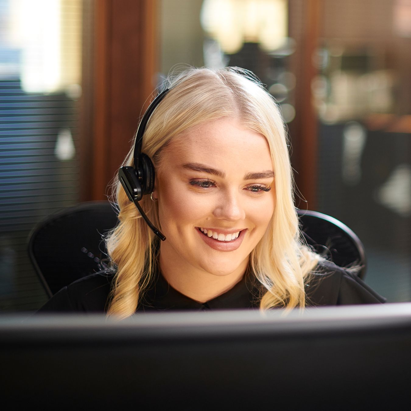 Customer Support Agent working. Representing MiniFinder Customer Service.