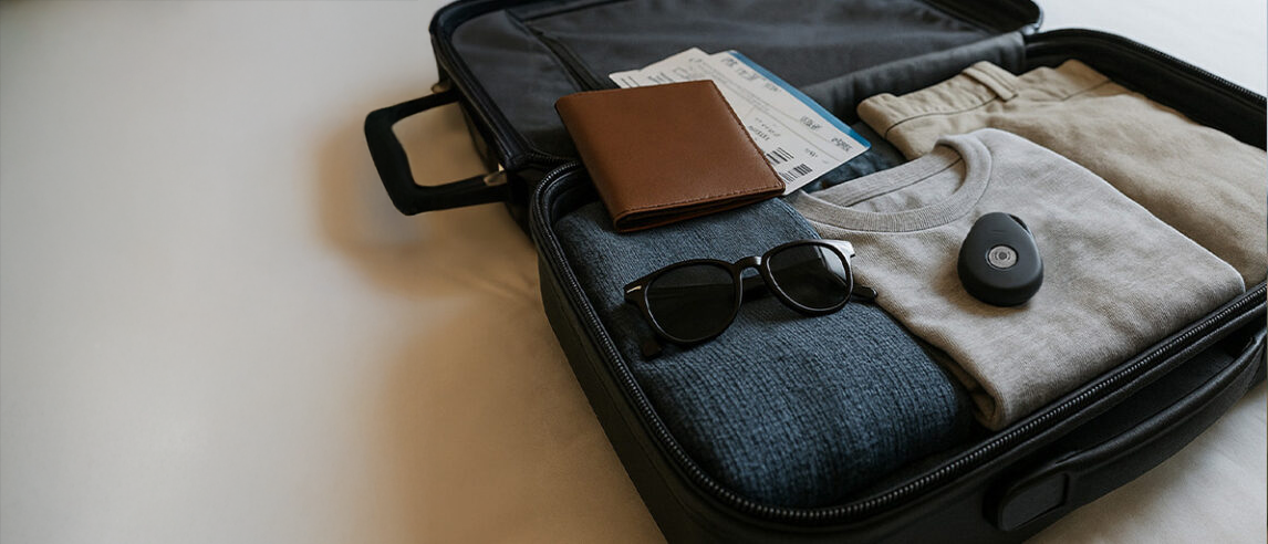 MiniFinder Pico placed inside a suitcase as an anti-theft GPS device