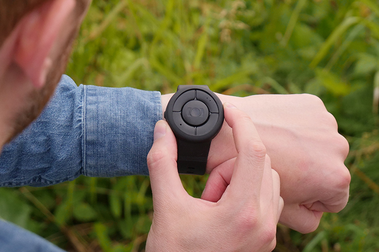 MiniFinder Nano on a mans wrist. Viewing it from the users point of view.