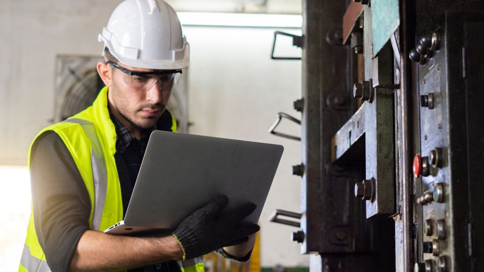 Lone worker carrying out a task in an industrial environment
